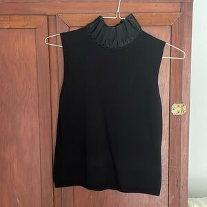 Kay Unger black sleeveless blouse w ruffle neck, size M
